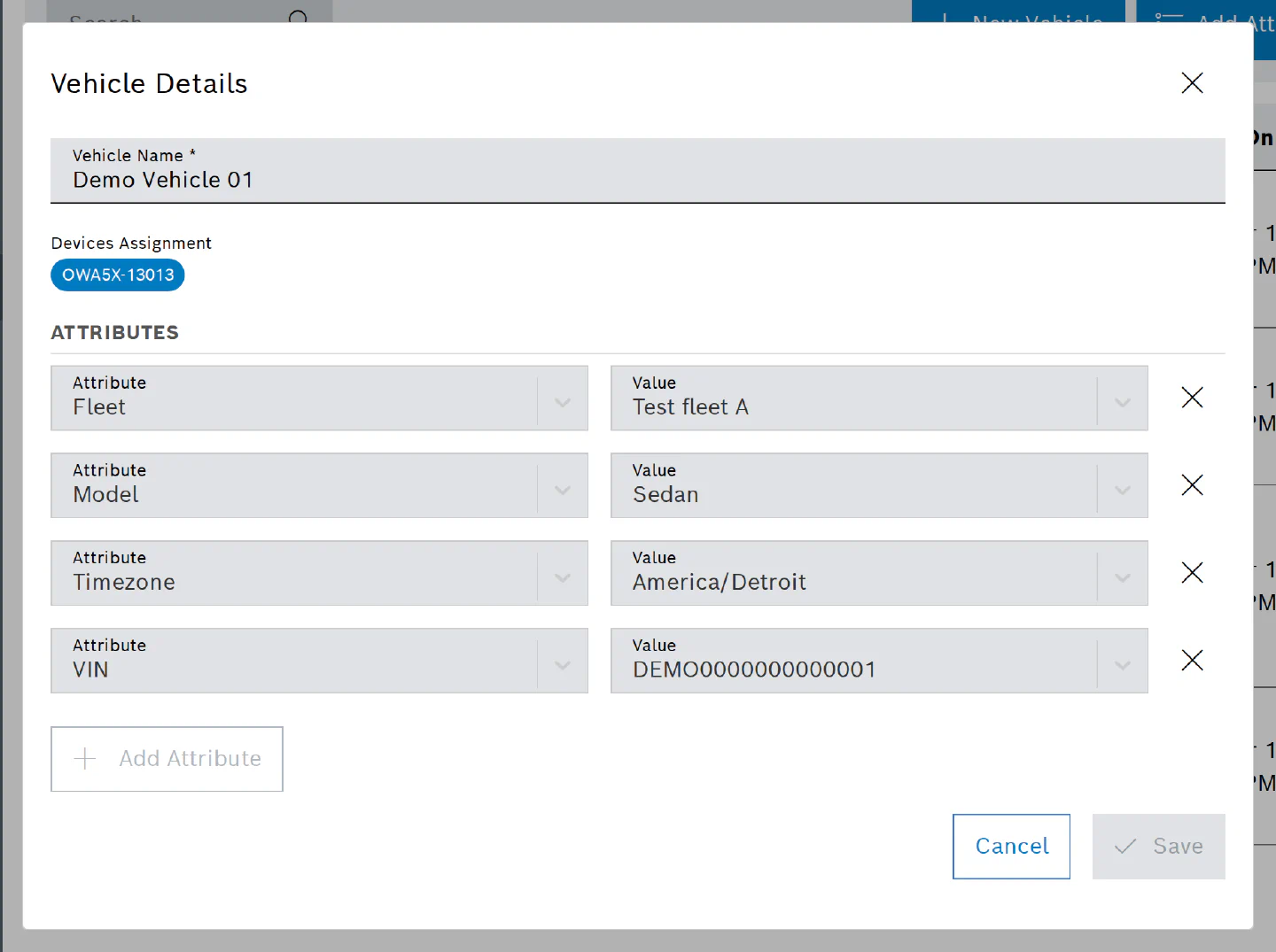 Vehicle Details dialog with the assigned device and four attributes